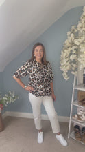 Load and play video in Gallery viewer, Animal Print Tie Front Top
